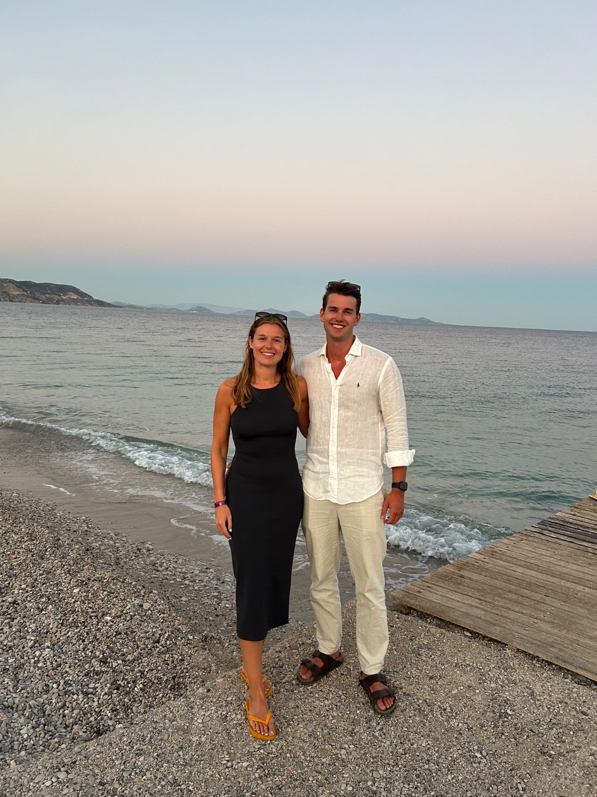 Rasmus and Victoria by the water at sunset